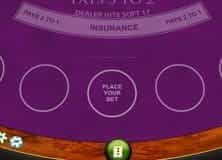 A hand of Blackjack Pro dealt on a purple table.