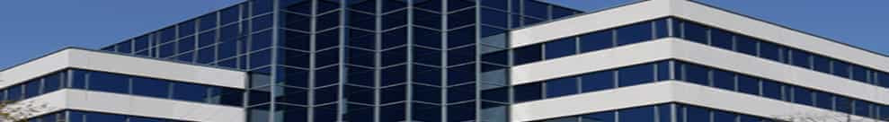 The Evolution Gaming logo on a background of an office.