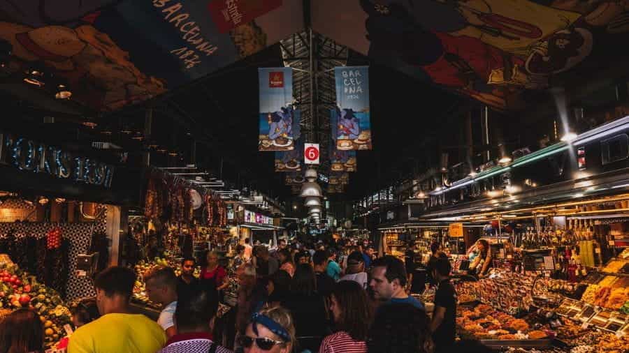 A busy indoor market in Barcelona, Spain.