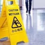 A slip hazard wet floor sign.