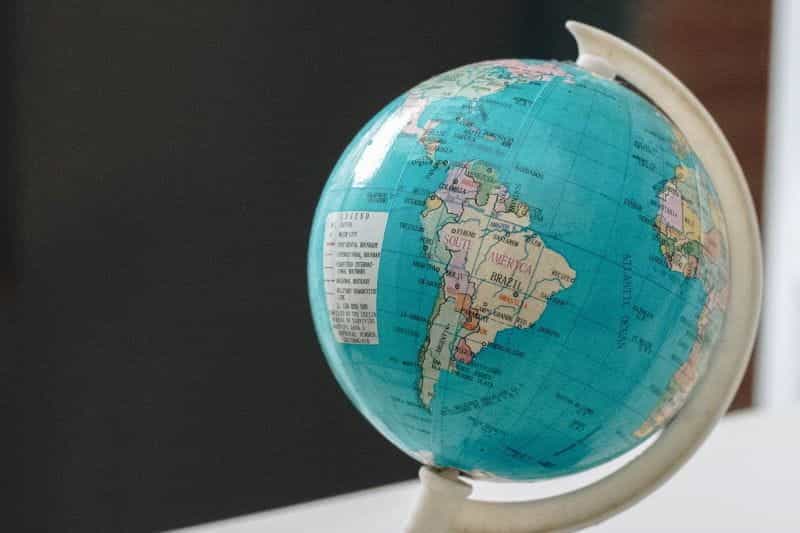 A globe shows the South American continent.