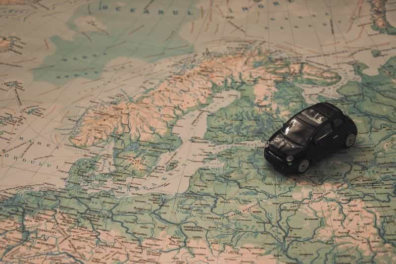 Car on a map of Europe.