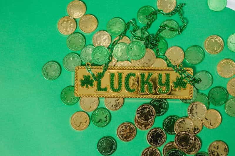 Lucky golden clover charm coins for St Patrick's Day.