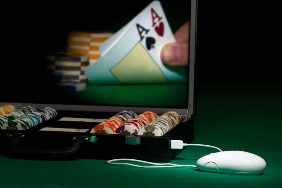 Cards, chips, and a computer mouse.