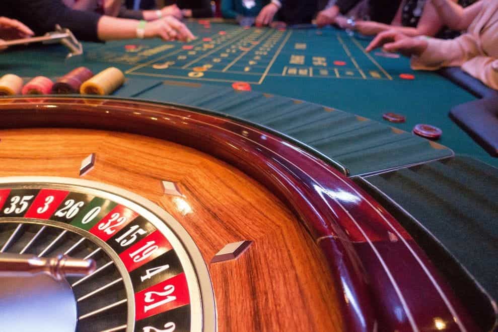 A roulette table game at a casino.