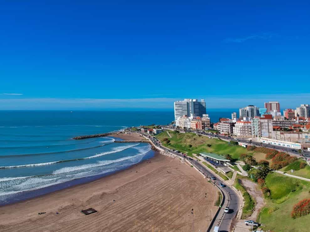A variety of buildings on the coast of Mar del Plata during the day.