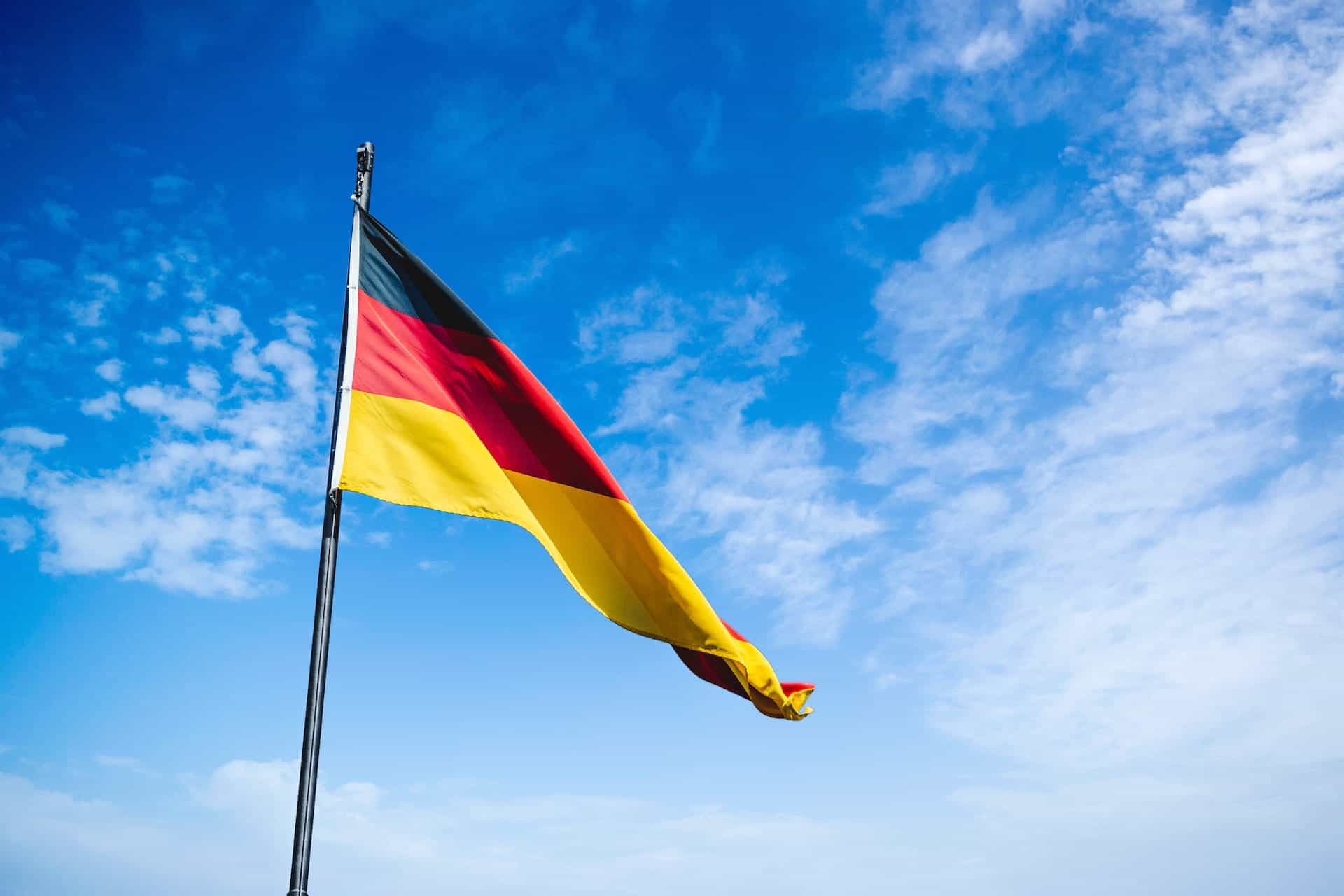 German flag fluttering in the breeze.