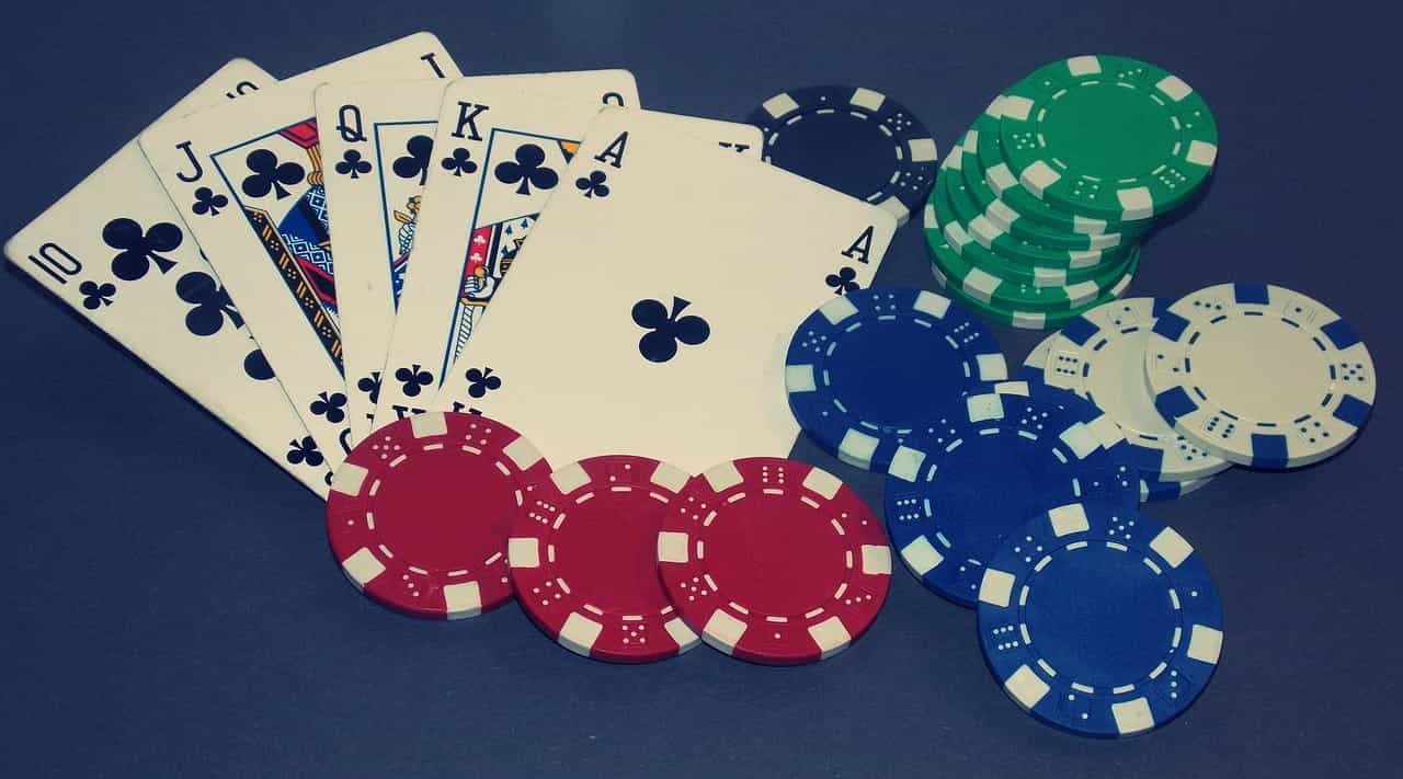 Poker hand and chips on the table