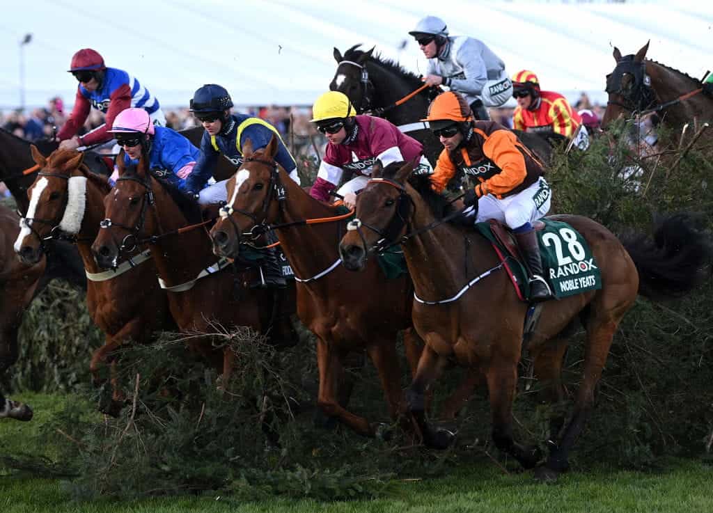 Sam Waley-Cohen riding Noble Yeats clears the Chair fence during the 2022 Grand National.