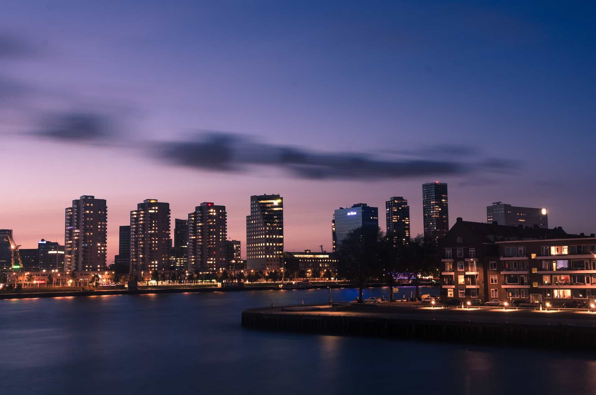 A city skyline at dawn.