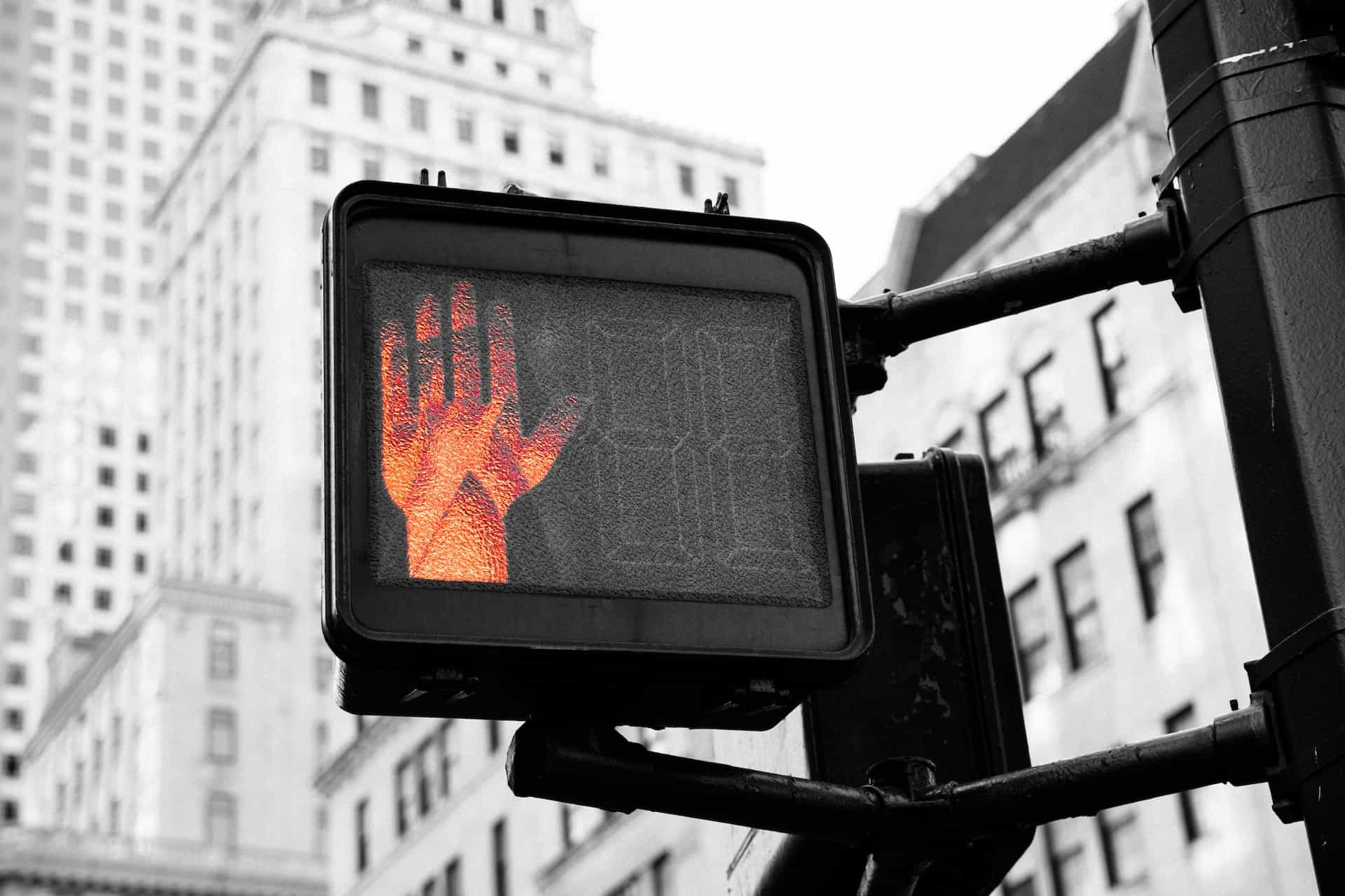 Closeup of a stop signal on a street.