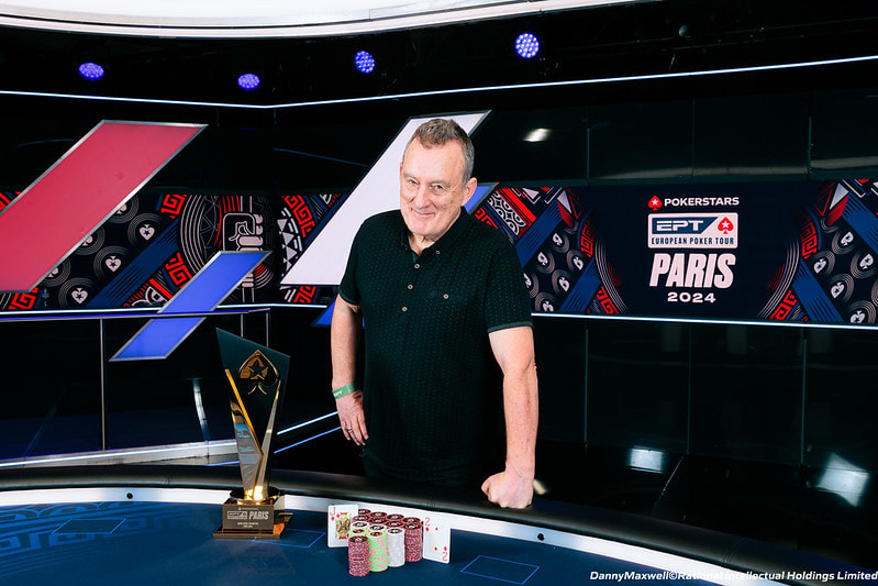 Barny Boatman poses before his 2024 EPT Paris trophy.