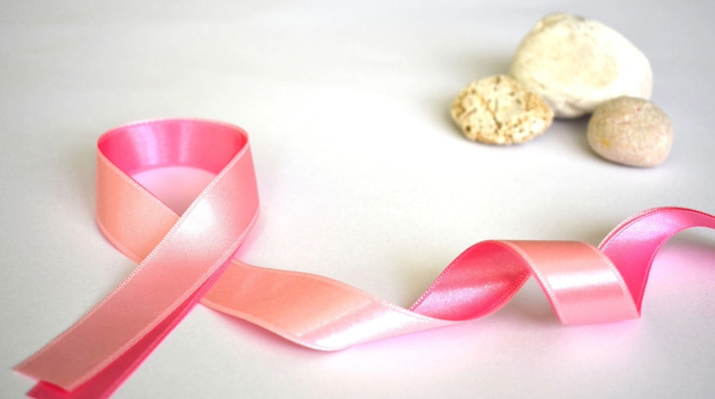 An image showing a pink ribbon in support of breast cancer awareness.